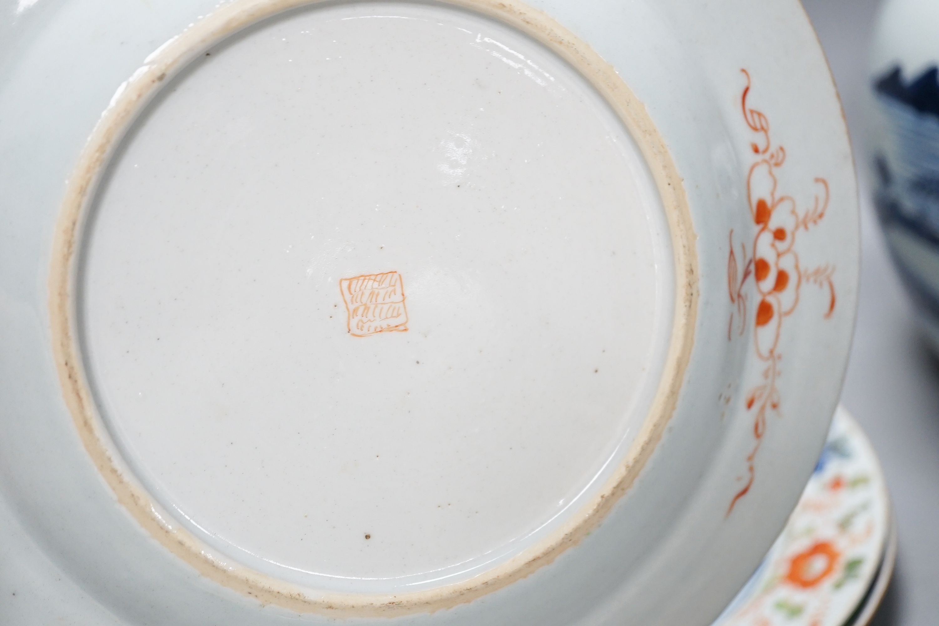 An 18th century Chinese blue and white jar, three 18th century clobbered Chinese plates and a pair of Satsuma vases